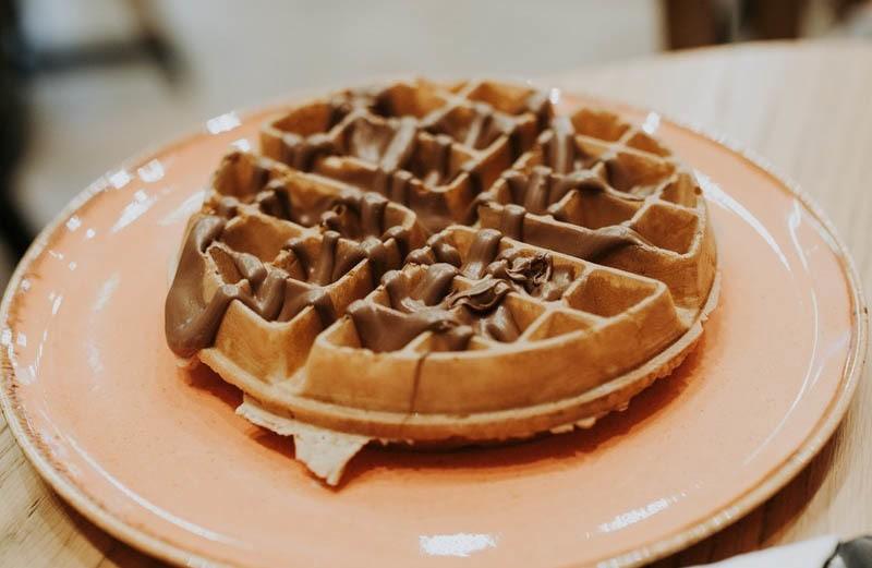 round waffle with peanut butter